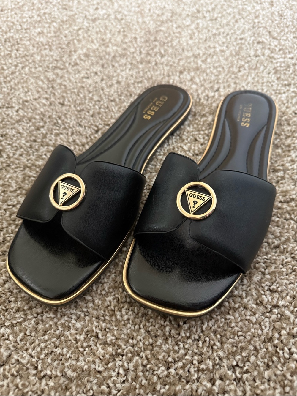 GUESS Black Slide Mules with Gold Trim and Logo